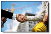 Handshake in front of Commercial Real Estate Building
